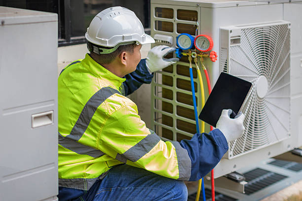 Professional Hvac Maintenance technician working in Westport Point, MA
